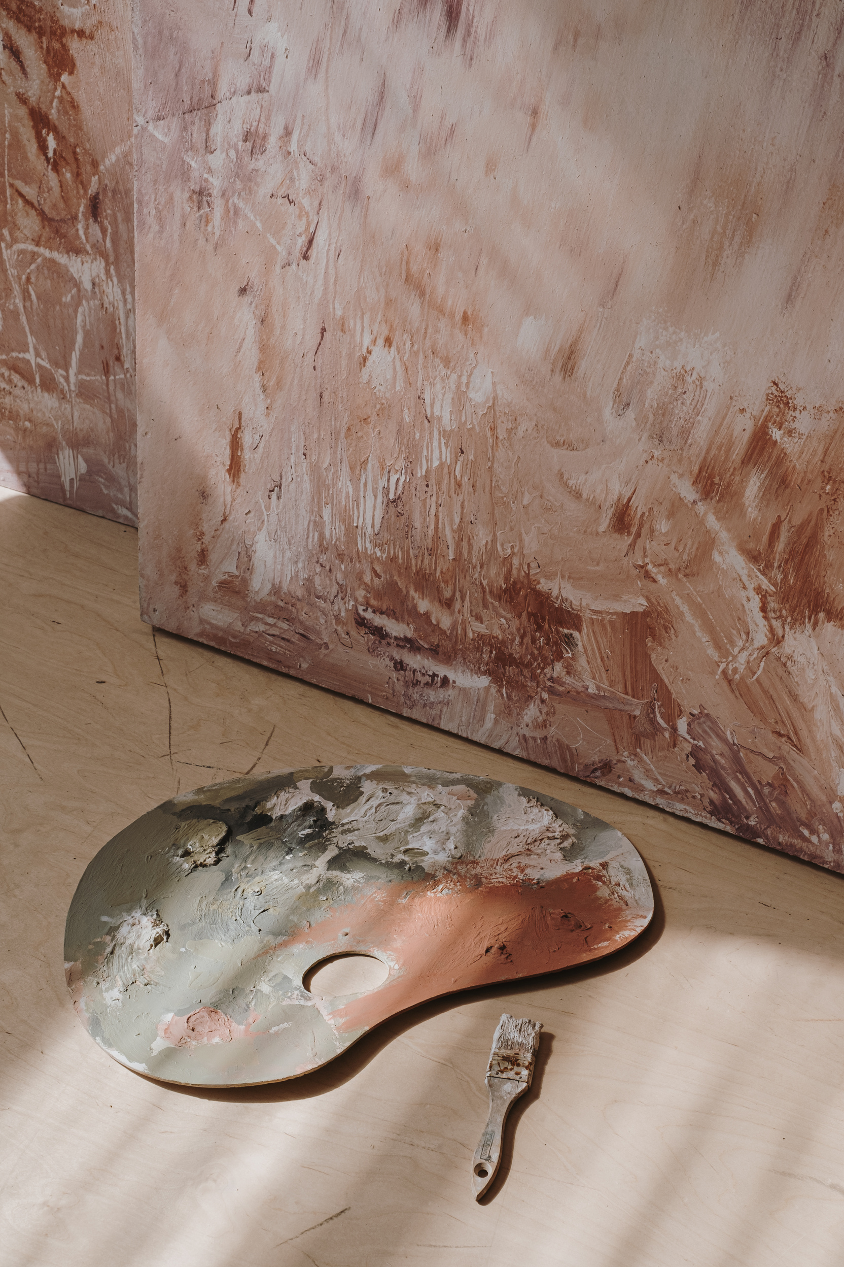 Painted Canvas, Palette and Paintbrush Composition