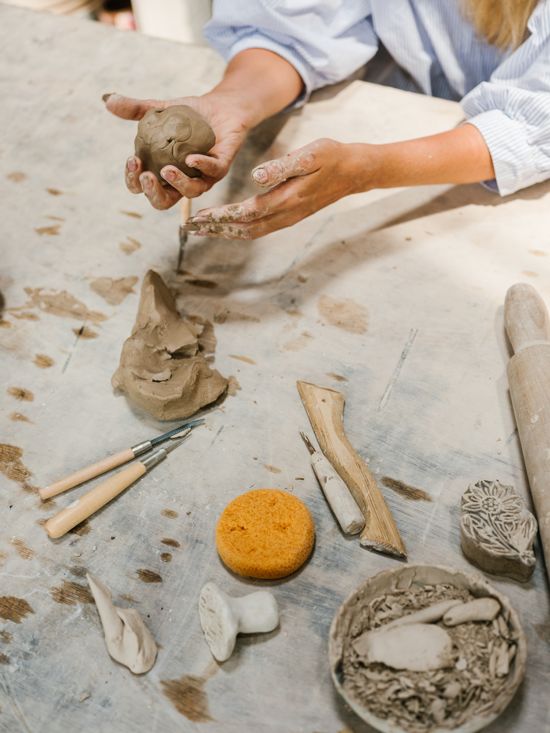 Close up of a Person Working with Clay